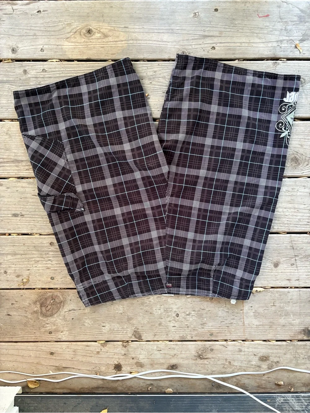 Quiksilver grail Black & Gray Plaid Board shorts.